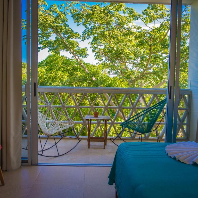 Suites Cielo y Mar - Suite with Garden View - 1