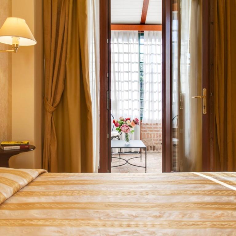 Hotel La Meridiana - Camera Matrimoniale con Patio - 1