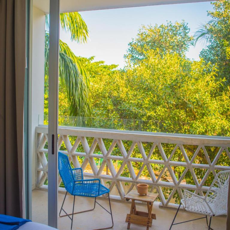 Suites Cielo y Mar - Suite with Garden View - 2