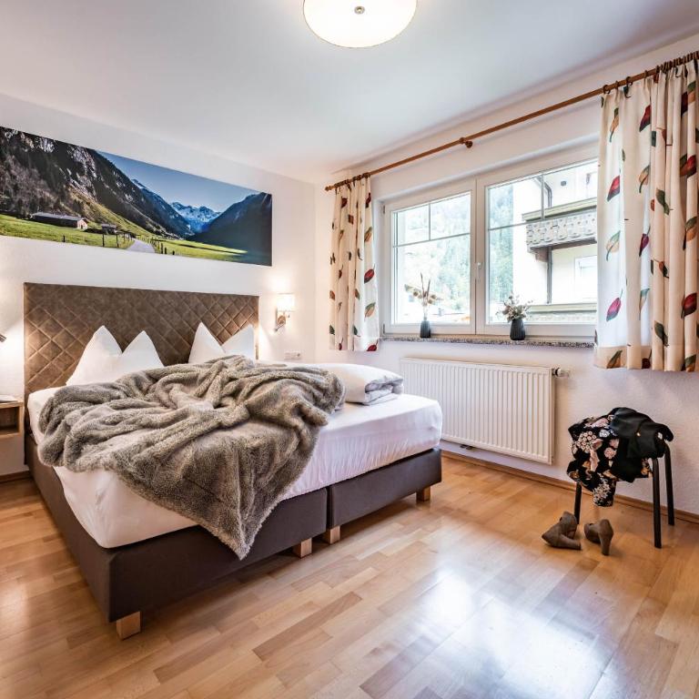 Gästehaus Wiesengrund & Apart Sporer - Comfort Apartment Top 1 mit 2 Schlafzimmern und Bergblick (2-5 Erwachsene) - 8