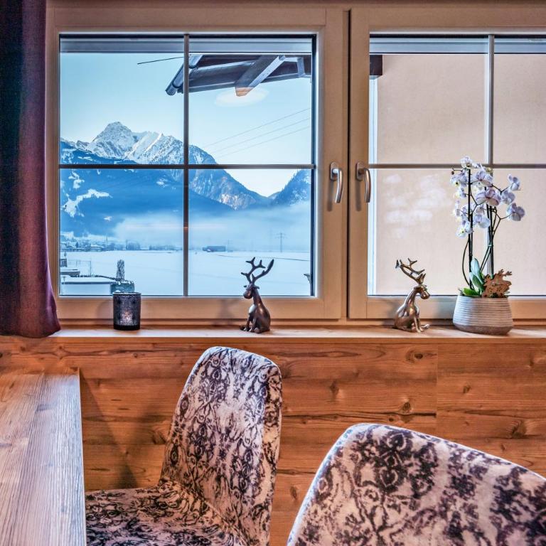 Gästehaus Wiesengrund & Apart Sporer - Apartment mit Blick auf die Berge - 14