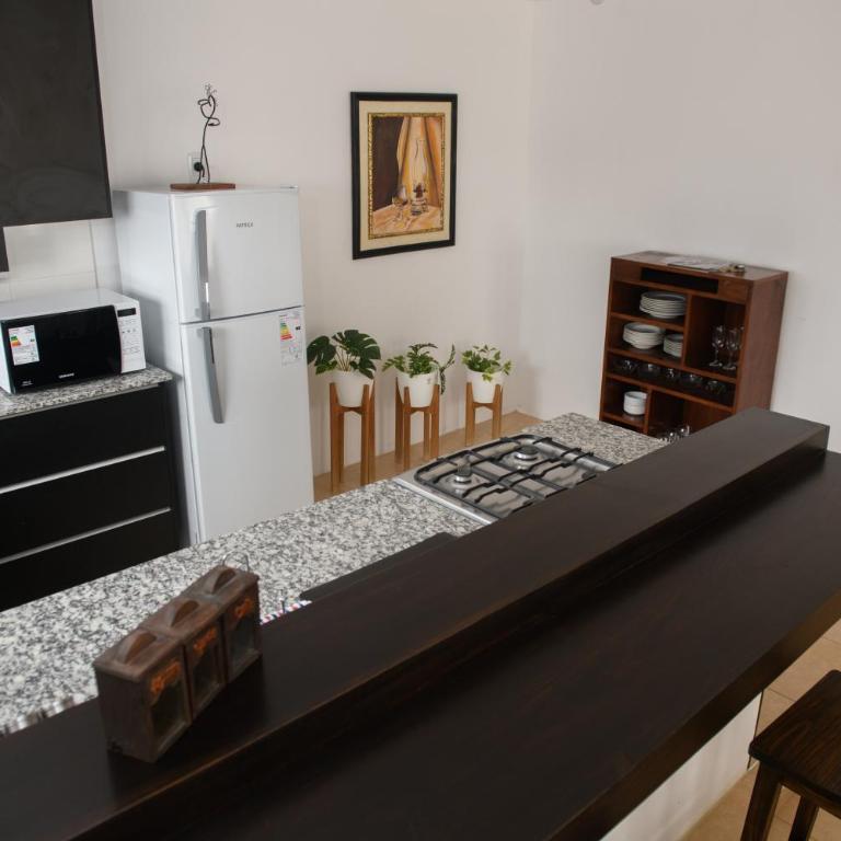 Departamento con terraza y quincho con asador - Three-Bedroom Apartment - 19