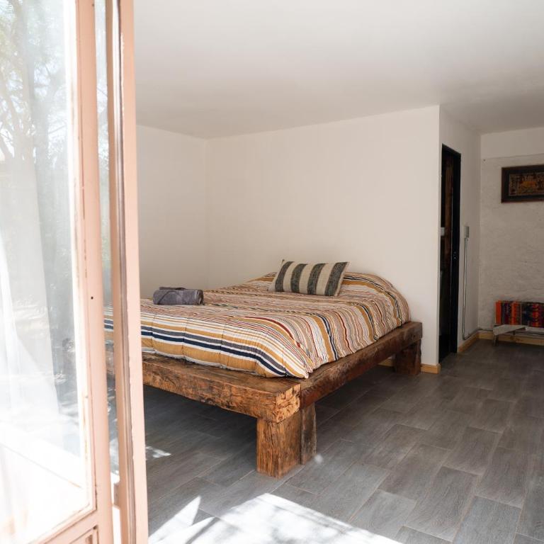 Vientos - La Yareta - Habitación con cama grande y vistas al jardín - 6