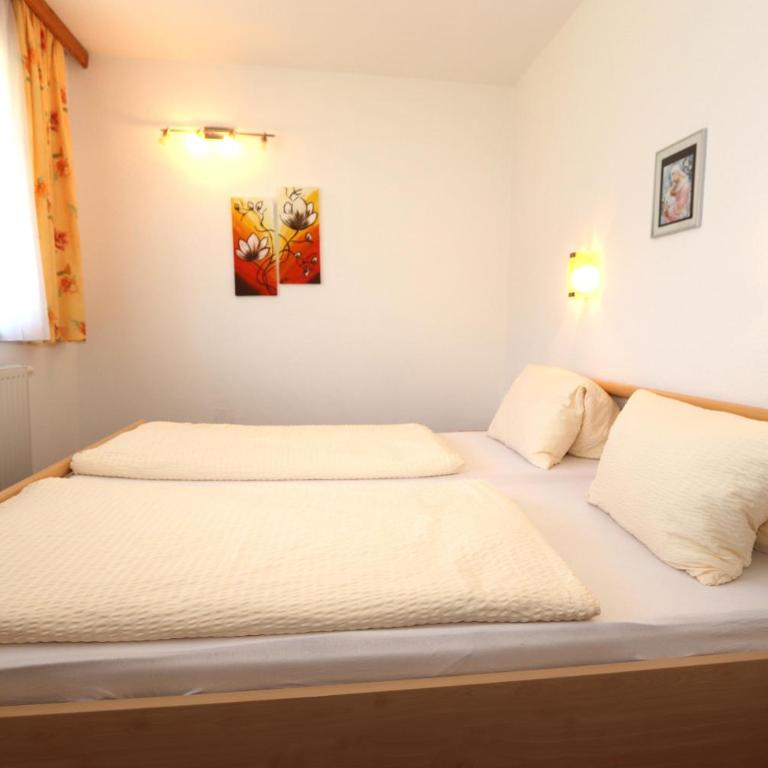 Ferienhaus Brandacher - Apartment mit 3 Schlafzimmern und Dusche - 11