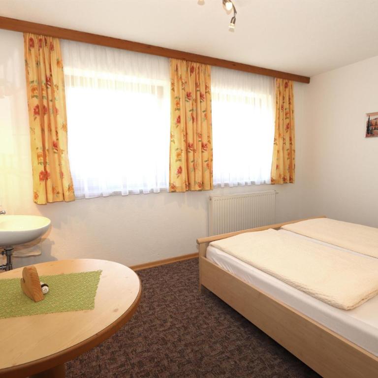 Ferienhaus Brandacher - Apartment mit 3 Schlafzimmern und Dusche - 13