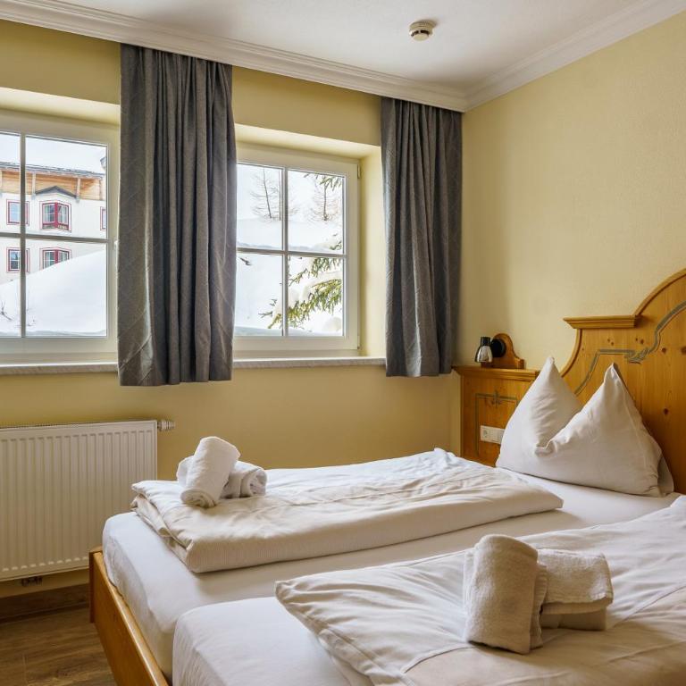 Hubertus Alpine Living - Apartment mit 3 Schlafzimmern und Balkon - 12