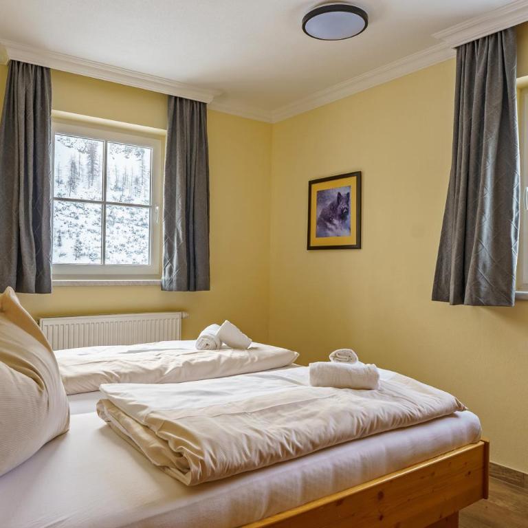 Hubertus Alpine Living - Apartment mit 3 Schlafzimmern und Balkon - 11