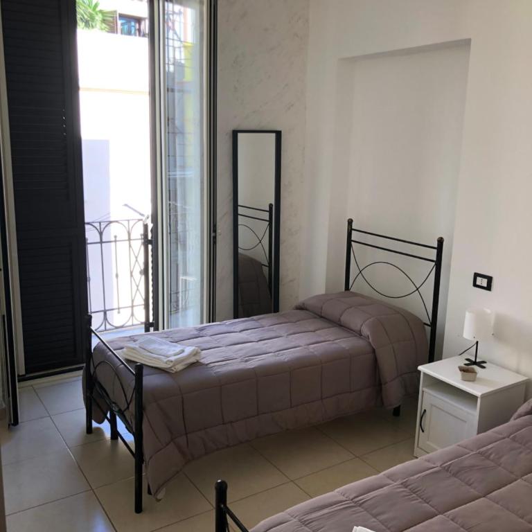 Terrazza famà - Two-Bedroom House - 6