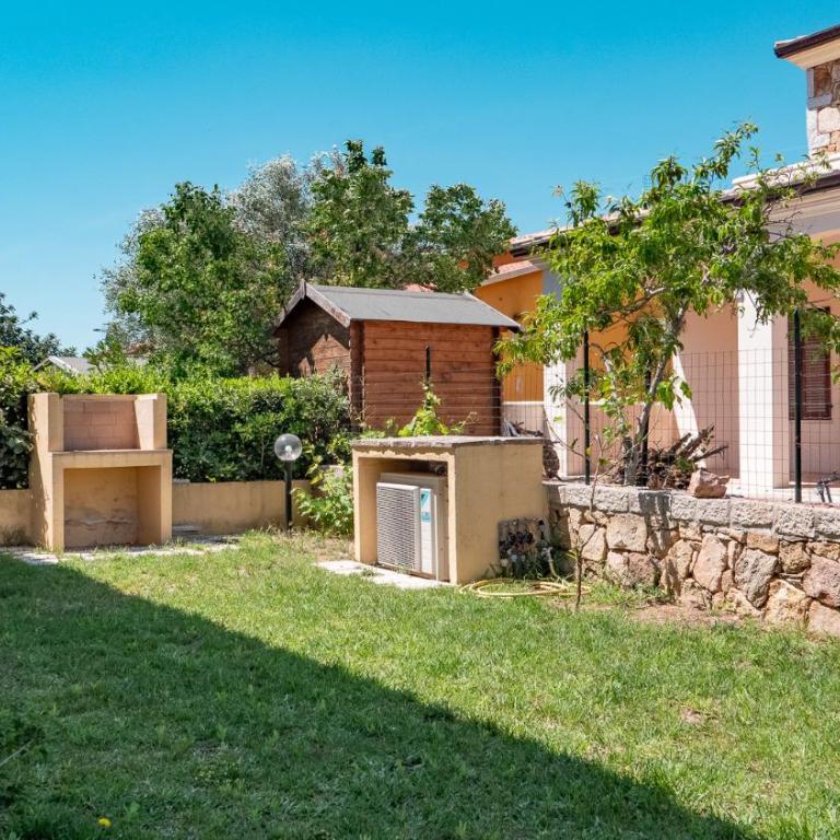 Casa Vacanza la Suaredda - Appartamento con Vista Giardino - 6
