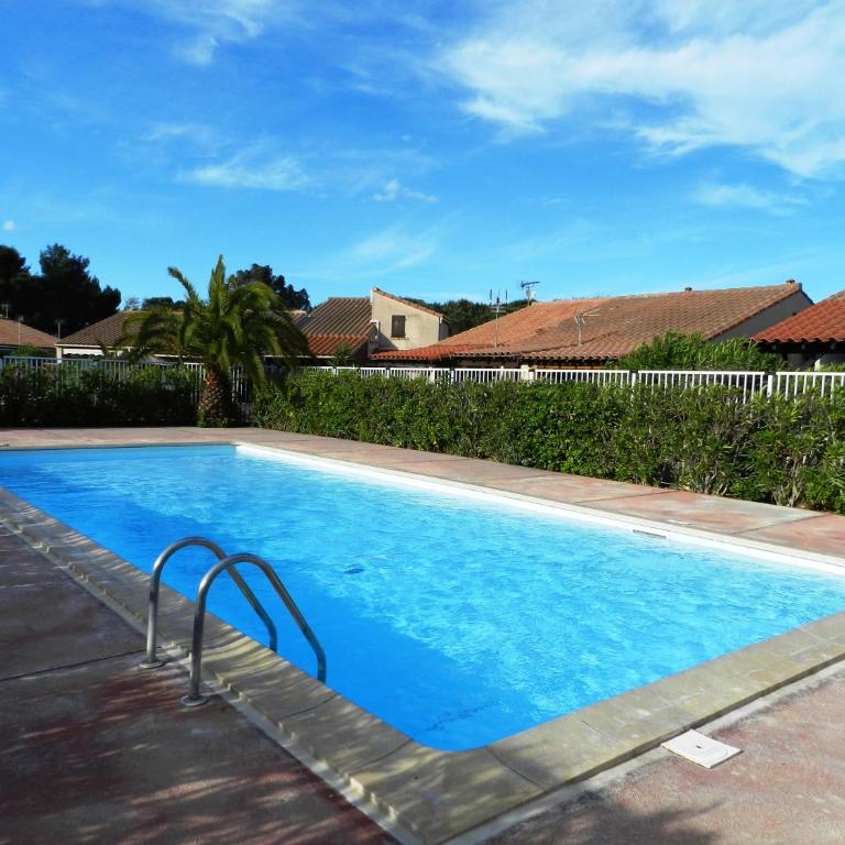 LES JARDINS D ETE Maison climatisée dans résidence avec piscine - 3 chambres - Parking - Wifi - Three-Bedroom House - 3