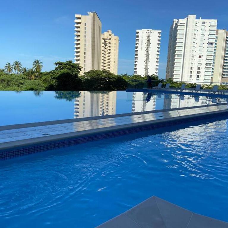 Modern well-equipped 4 PPL condo/5 MIN beach walk - One-Bedroom Apartment - 5