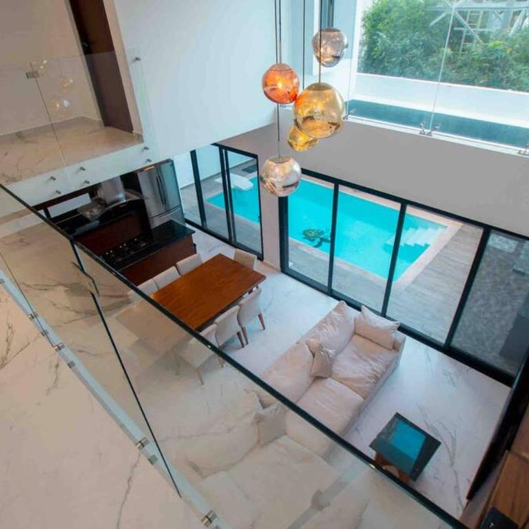Casa Moderna de 4 Pisos Con Rooftop Vista Al Mar - Five-Bedroom House - 1
