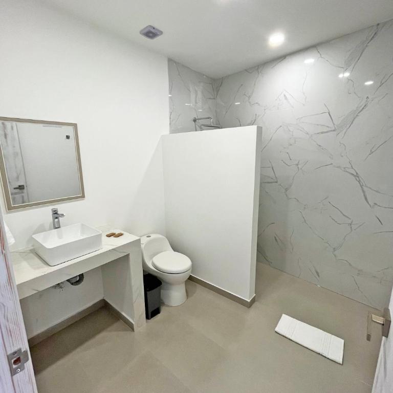 Zaba Beach House - Deluxe Triple Room with Sea View - 1