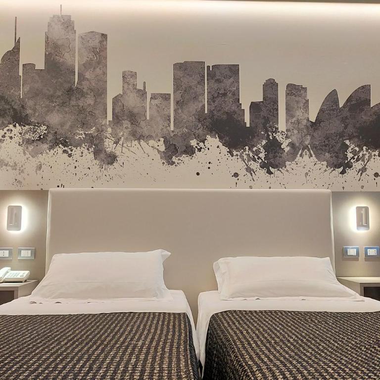 The Sydney Hotel - Camera Deluxe Doppia con Letti Singoli - 1
