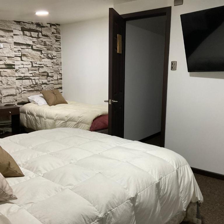 Hostal Umantun - Deluxe Double Room (2 Adults + 1 Child) - 4