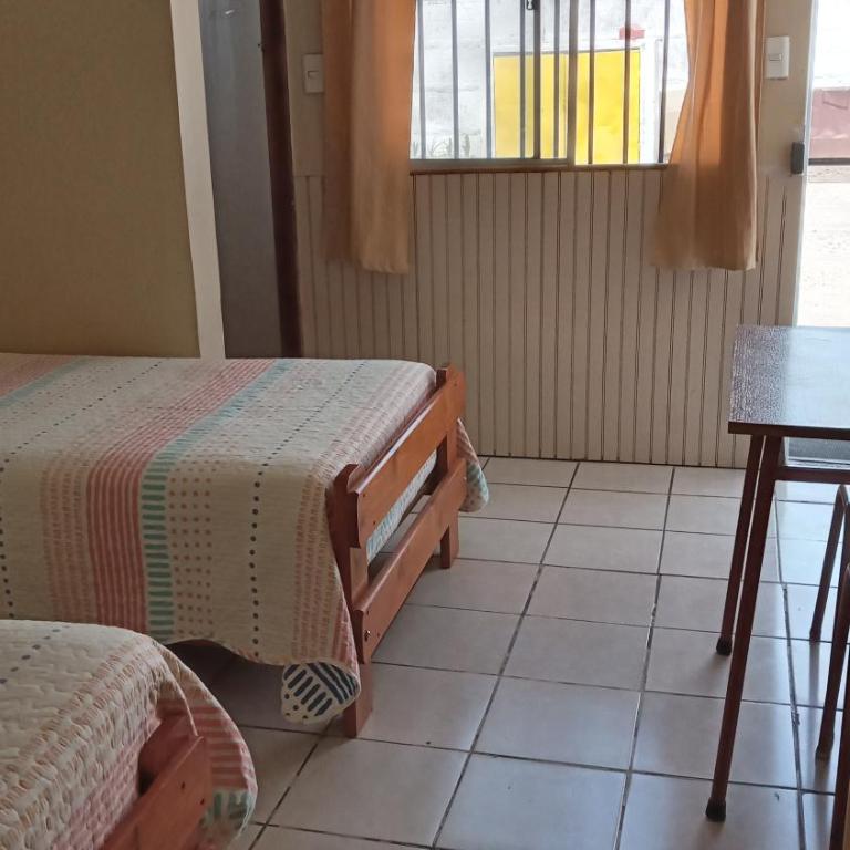 Hostal Amunategui- Sucursal Aguirre - Triple Room with Private Bathroom - 1