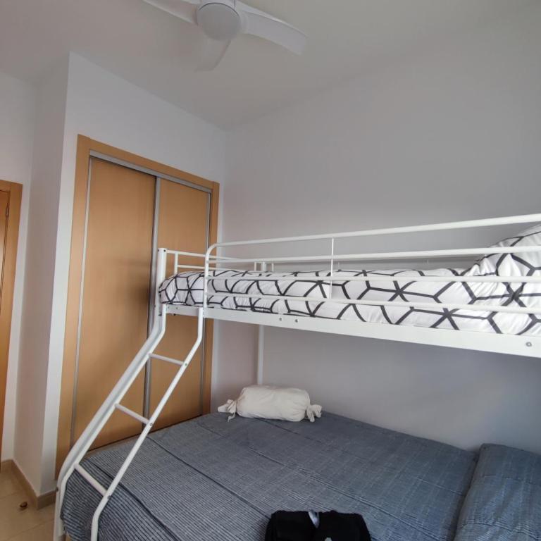 Apartamento con patio, piscina y parking privado - Apartamento - 9