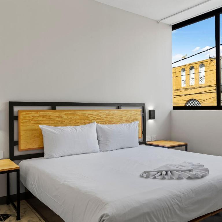 Suites Reforma by HomiRent - Suite Deluxe con cama extragrande - 8