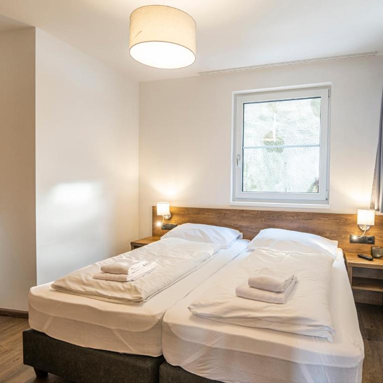 AlpenParks Hotel & Apartment Alpendorf - Superior Apartment mit 2 Schlafzimmern - 17