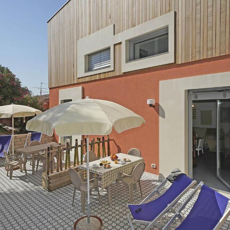 Residence Arca - Appartamento Monolocale Plus con Terrazza e Vista Giardino - 10