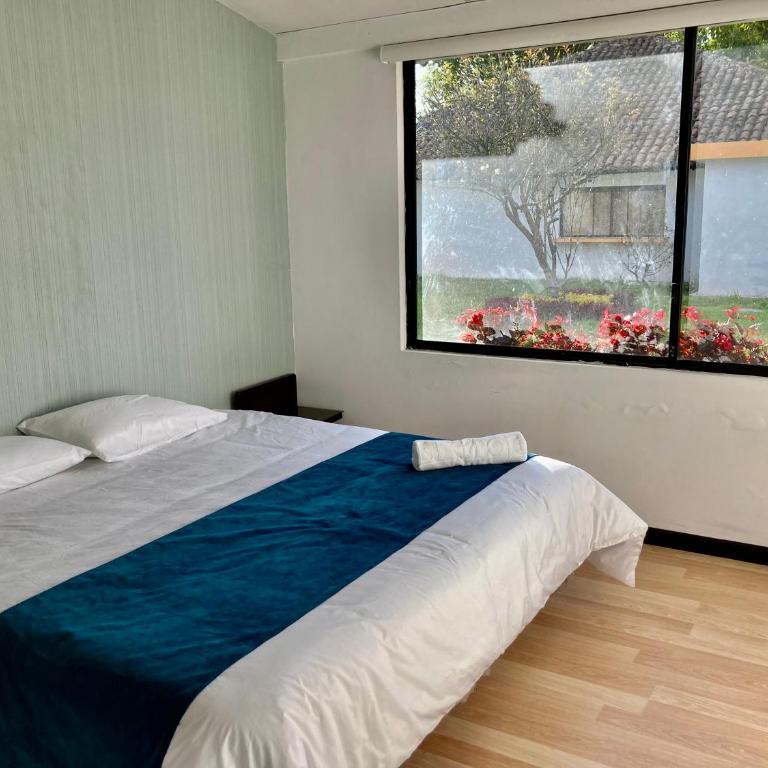 Hostería El Troje Experience - Habitación con cama extragrande y vistas al jardín - 12