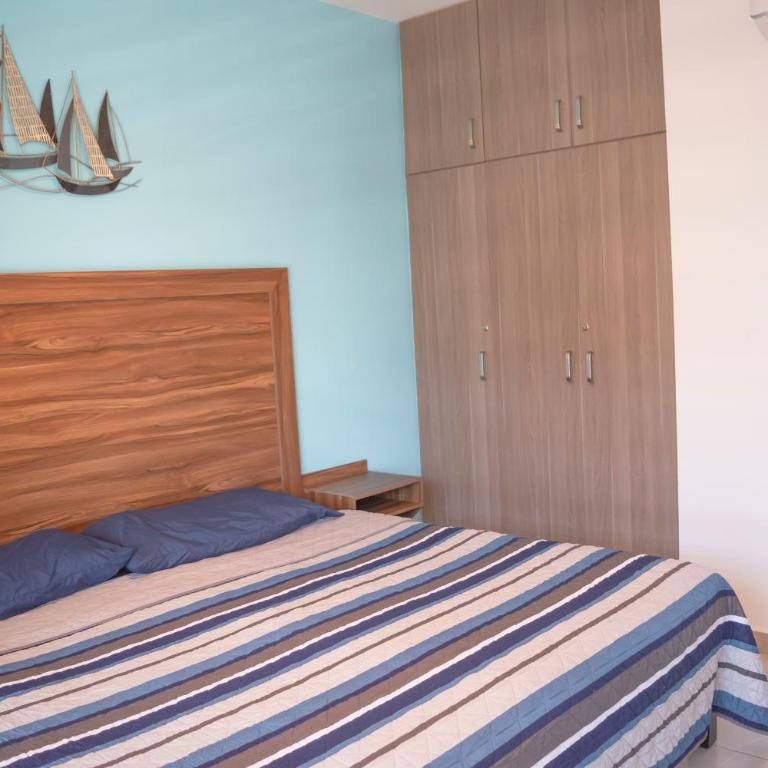 Depa en la marina a 5min de la playa by G P S rentas - Three-Bedroom Apartment - 14