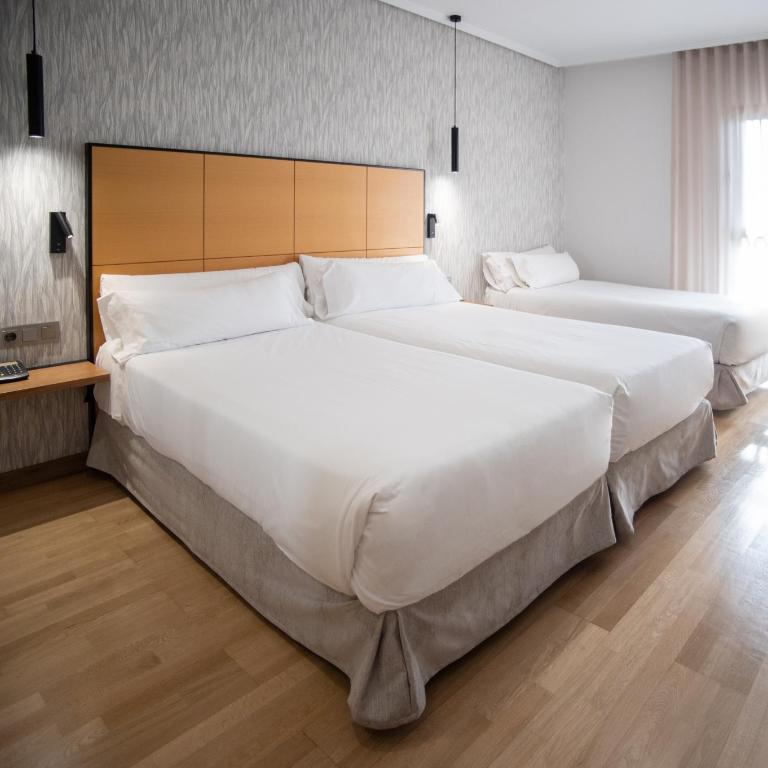 Sercotel Gran Fama - Habitación Doble con sofá cama - 2 camas - 1