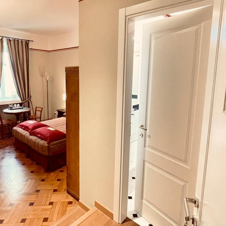 Residenza Le 6 A - Camera Matrimoniale/Doppia con Letti Singoli con Angolo Cottura - 4