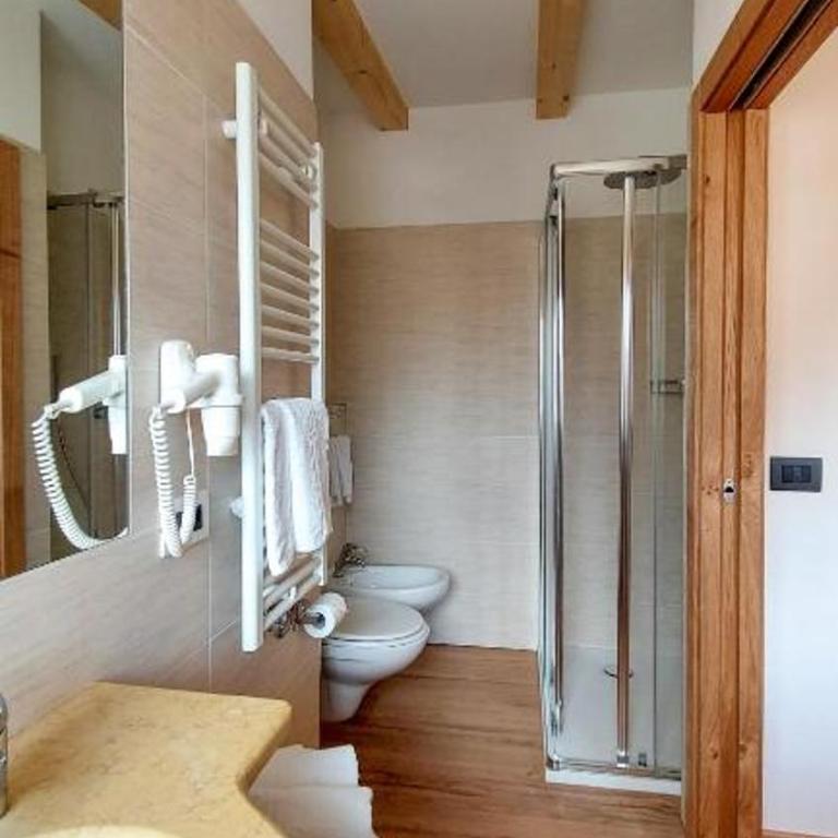 Albergo Arnica - Camera Quadrupla Comfort - 1