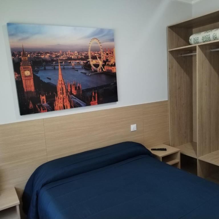 HOSTAL CID - Habitación con cama grande - 2
