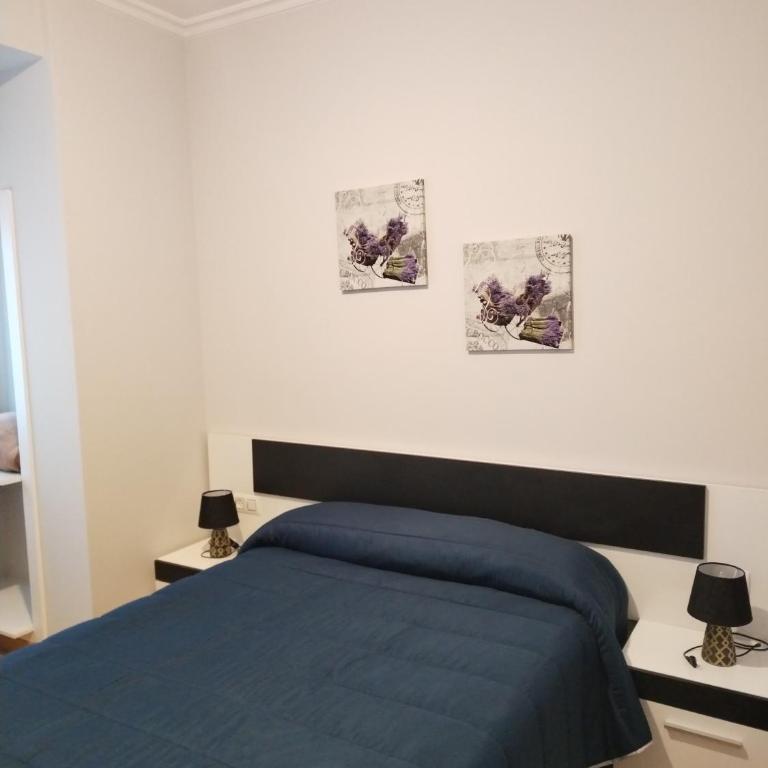 HOSTAL CID - Habitación con cama grande - 1