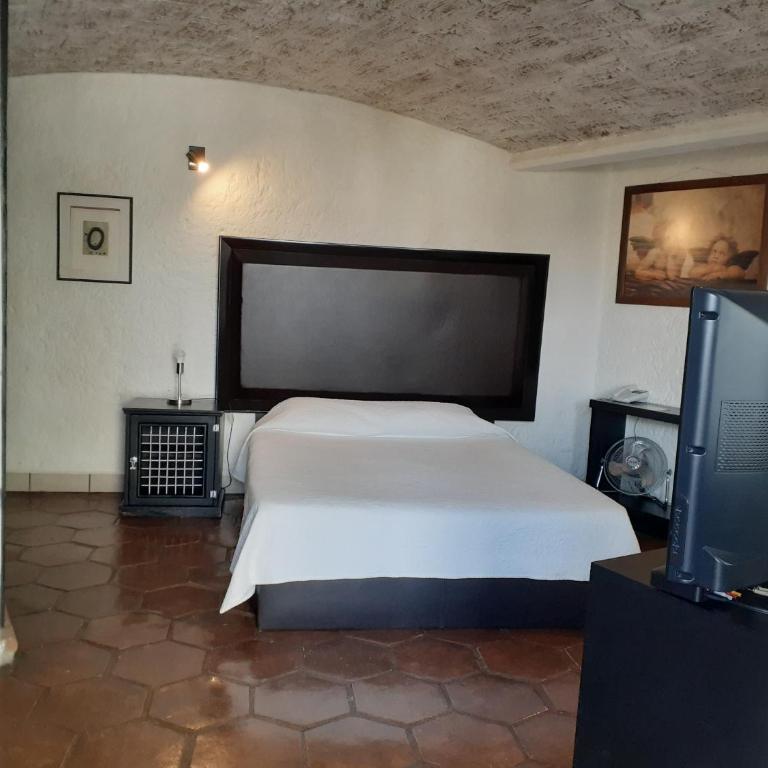 Casa Blanca San Miguel - Habitación con cama grande - 9