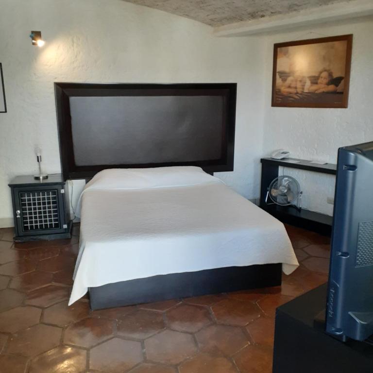 Casa Blanca San Miguel - Habitación con cama grande - 8