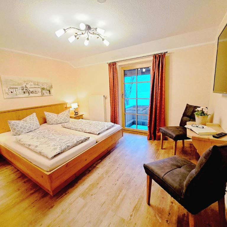 Pension Carina - Comfort Doppelzimmer mit Balkon und Seeblick - 14