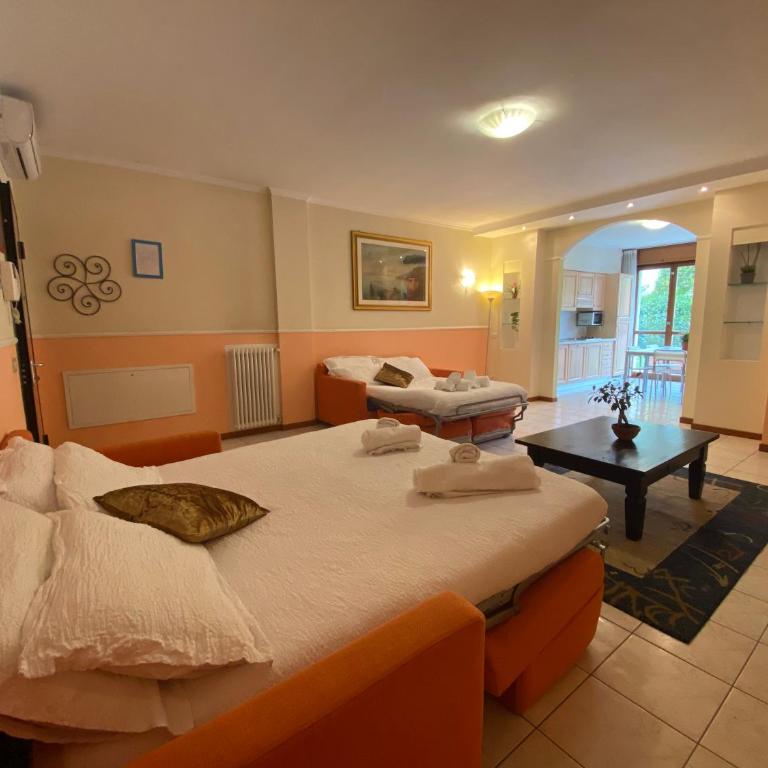 Ferretti Residence Garda Palace - Appartamento Executive con 2 Camere da Letto e Vista Giardino - 1