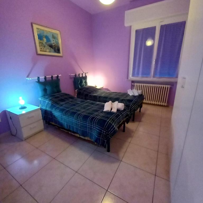Affittacamere Appartamento colorato - Camera Queen con Bagno in Comune - 13