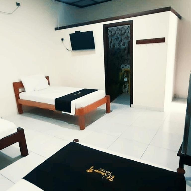 Wikungo Hotel - Habitación Triple Deluxe - 3