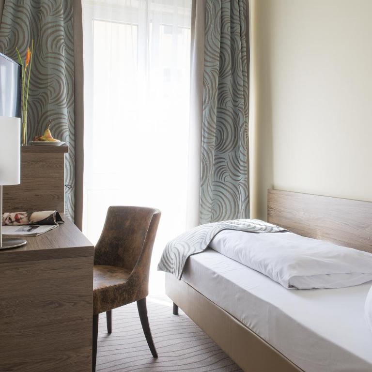 Hotel Schlicker - Standard Einzelzimmer mit Dusche und Klimaanlage - 5