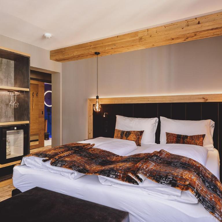POST POST Hotel - Alpine Boutique Hotel & Spa - Suite mit Sauna und Balkon - 3