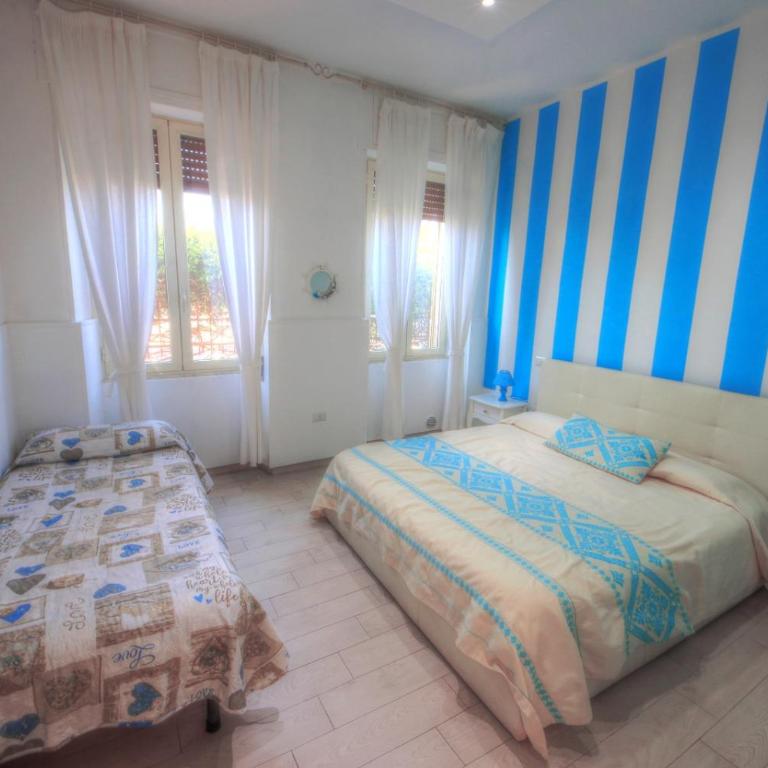 ### Appartamenti sulla SPIAGGIA al POETTO ### - Appartamento Superior - 6