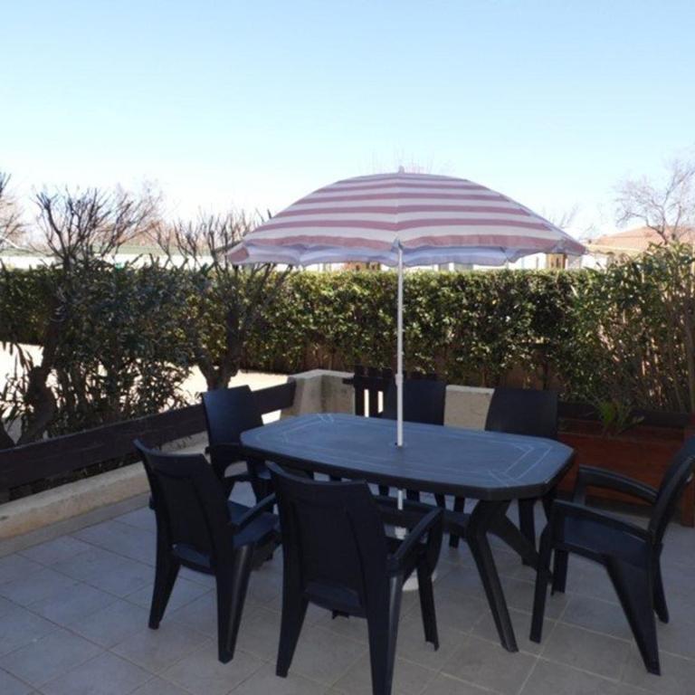 Appartement T2 cabine en RDC avec terrasse privative, parking et équipements confortables. - FR-1-326-383 - Appartement (5 Adultes) - 1