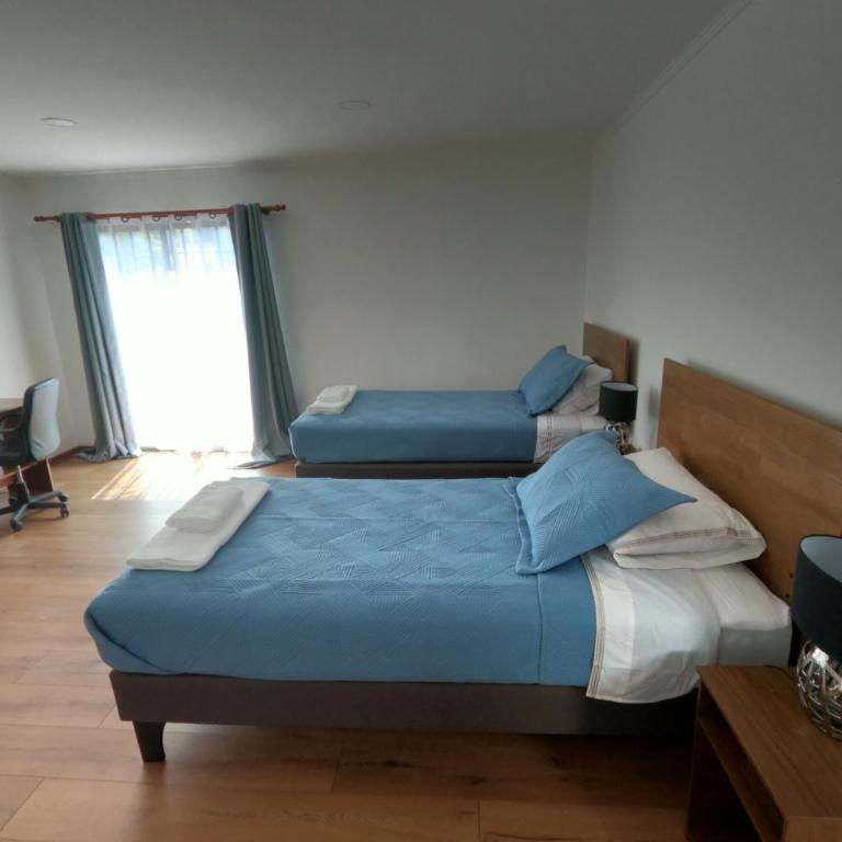 Hostal La Ruca - Habitación Doble con baño privado - 1 o 2 camas - 4