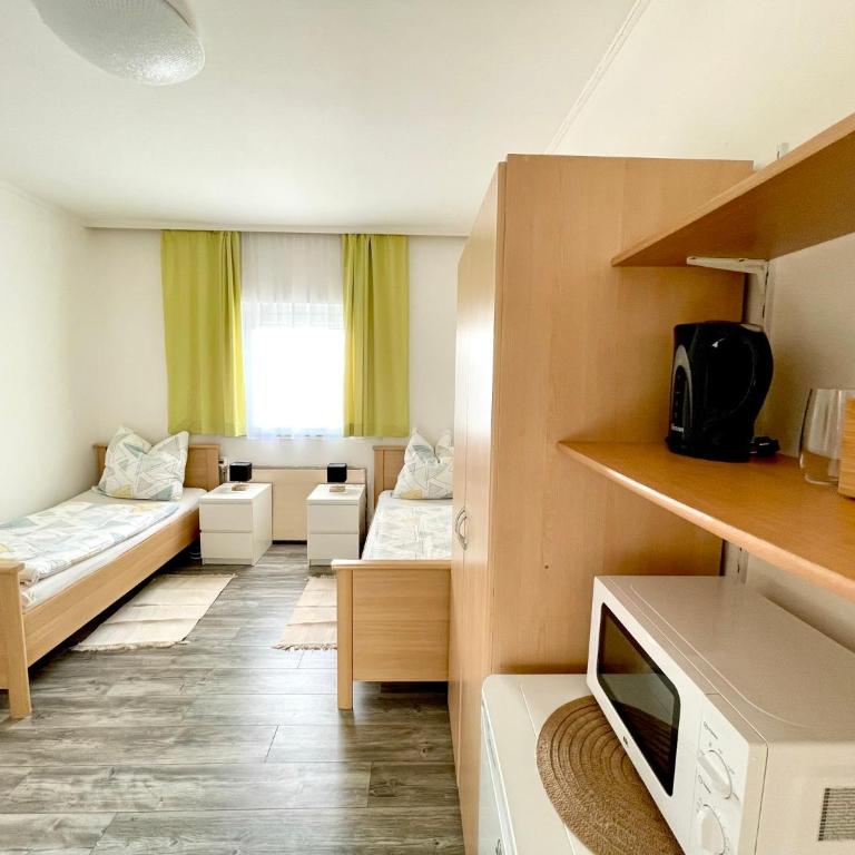 SmartRooms24 - Zweibettzimmer mit Gemeinschaftsbad - 5