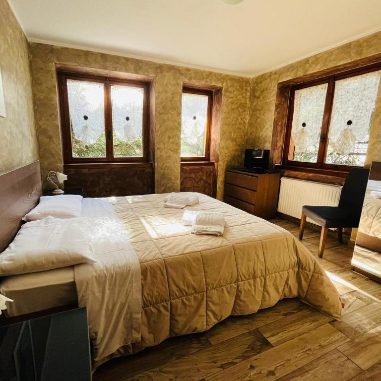 San Luigi - Rooms & Apartments - Camera Quadrupla Superior - 1