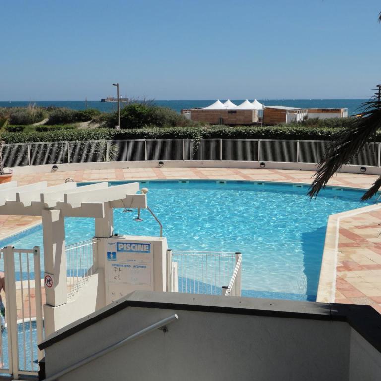 SUNSET Charmant T2 avec coin cabine vue mer piscine Rochelongue Cap d'Agde - Apartamento con vistas a la piscina - 12