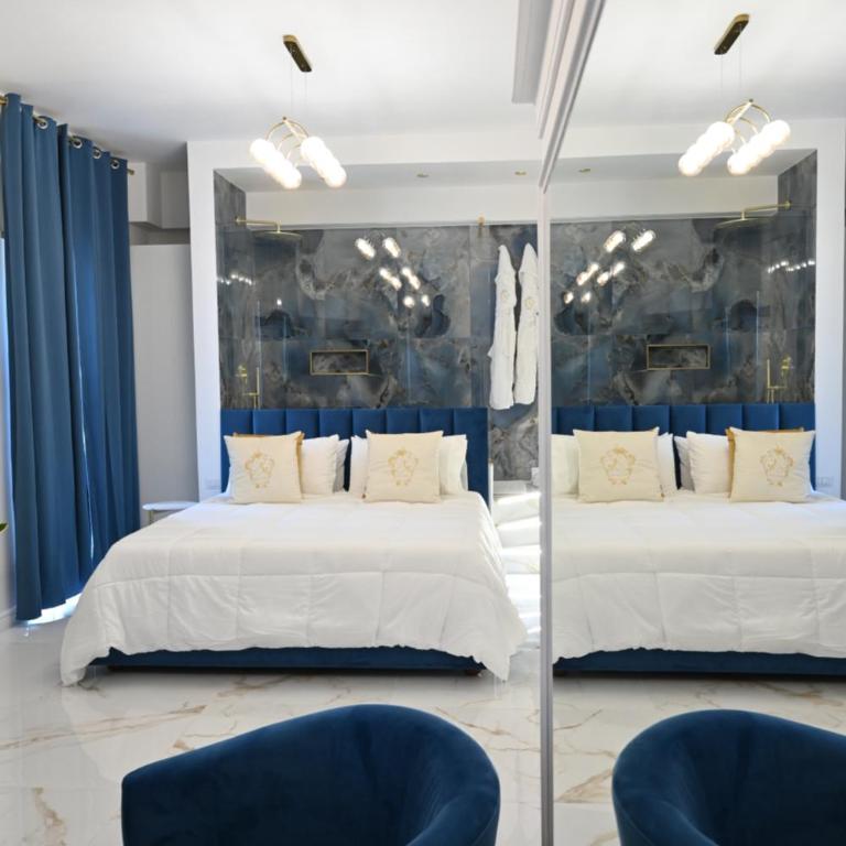 NM Luxury Suites - Camera King Superior - 4