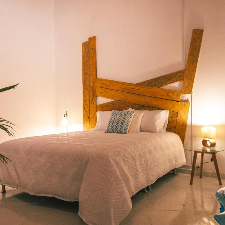 PIA COLOMBIA - Habitación con cama grande y vistas al jardín - 1
