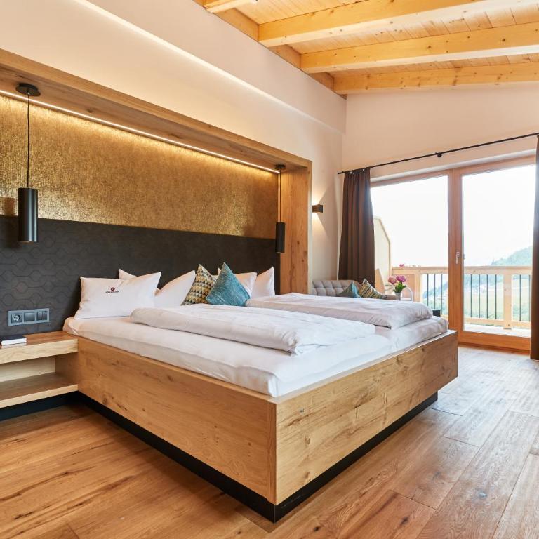 Hotel Jörglerhof - Suite mit Kingsize-Bett und Balkon - 6