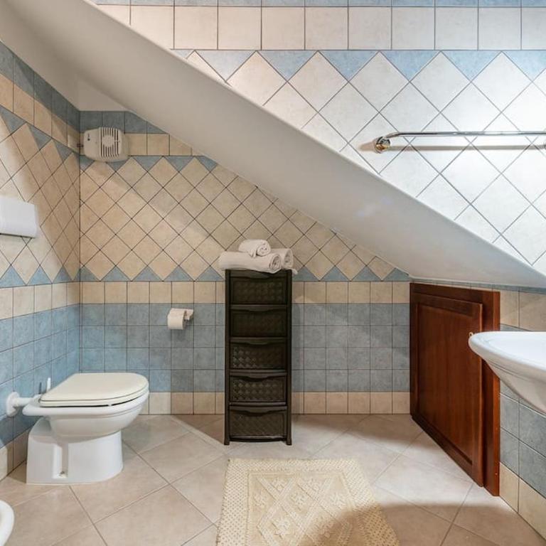 AffittaSardegna-Casa Rosa Dei Venti - Appartamento con 3 Camere da Letto - 32