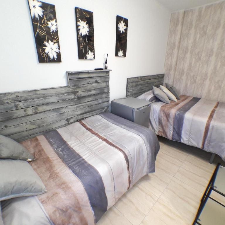 Pensión La Estación - Habitación Triple con baño privado - 11